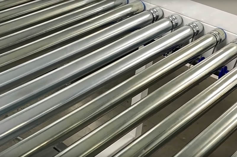 Amber Industries - Trasportatore ad albero con trasferimento a catena a 90 gradi