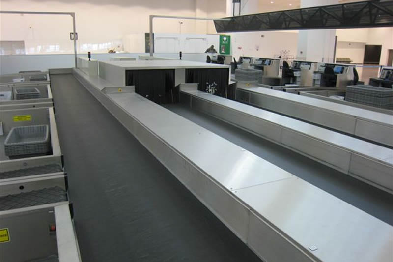 Belt Curves for Airport Baggage Handling Systems