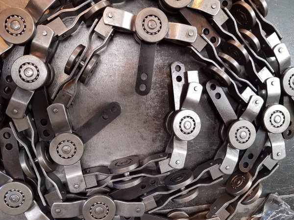 Ricollega il tuo nastro trasportatore aereo esistente con una nuova catena